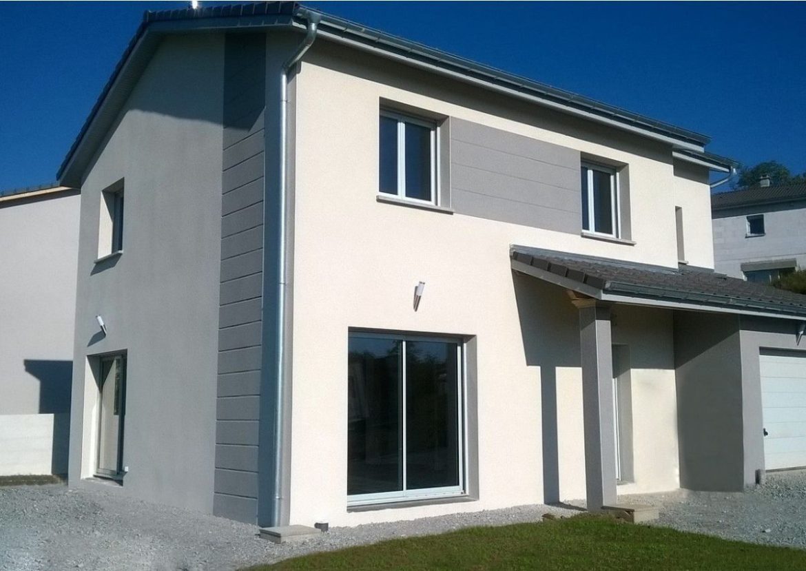 Modèle de maison neuve Maisons Punch Maison neuve et moderne de Maisons Punch avec façade bicolore beige et grise.